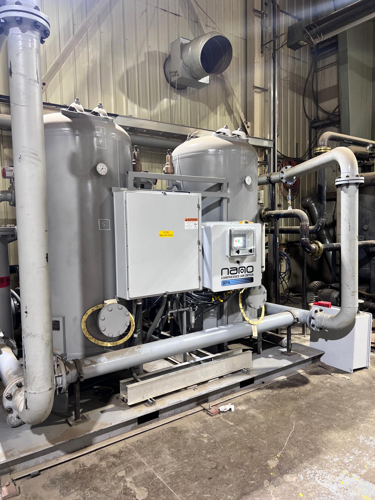 Compressed air treatment system in an industrial plant